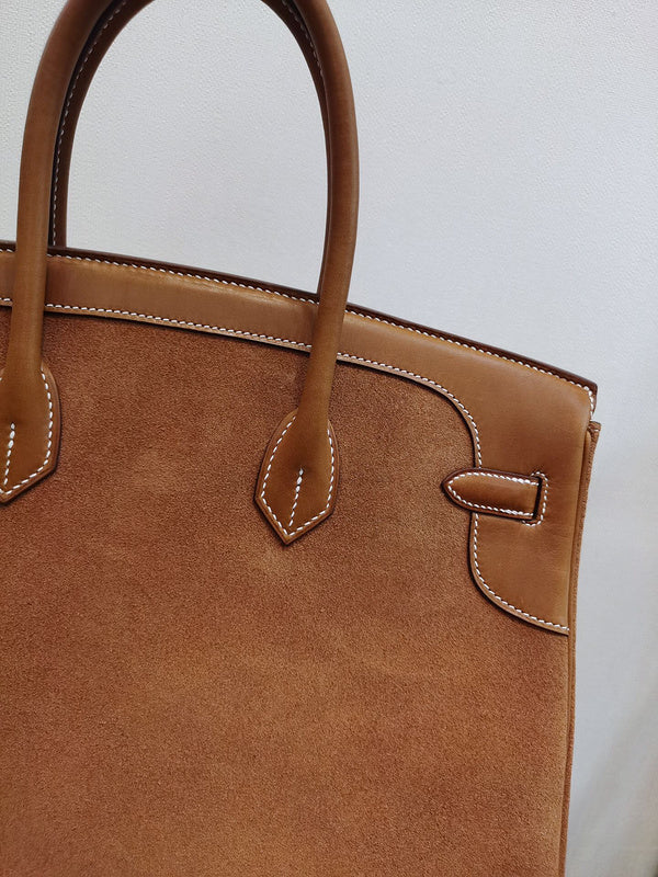 Side view of curated structured handbag