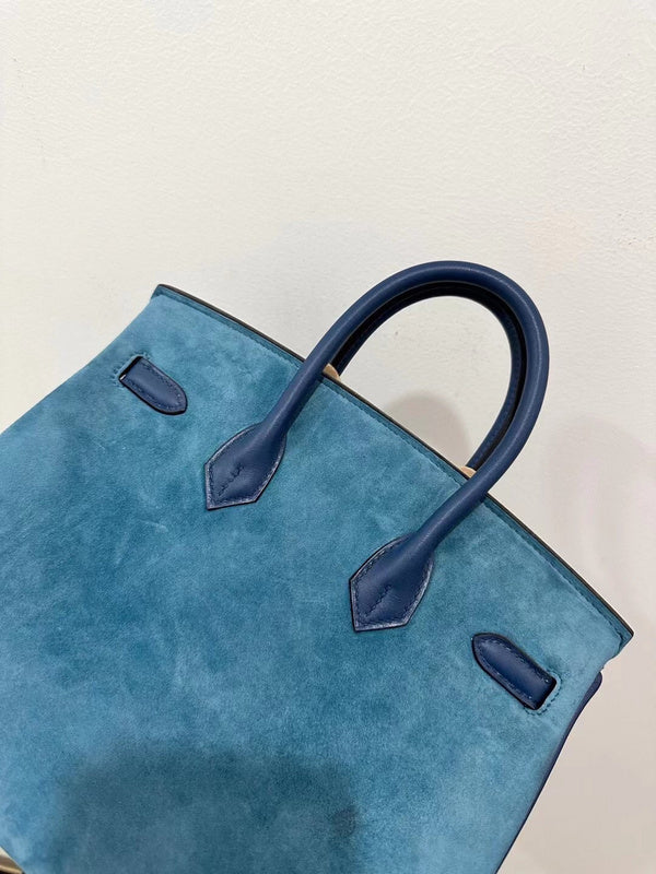 Side view of classic structured handbag