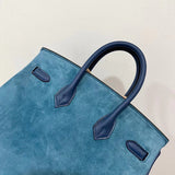 Side view of classic structured handbag