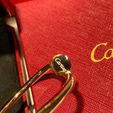 Lifestyle view of Cartier unisex jewelry piece