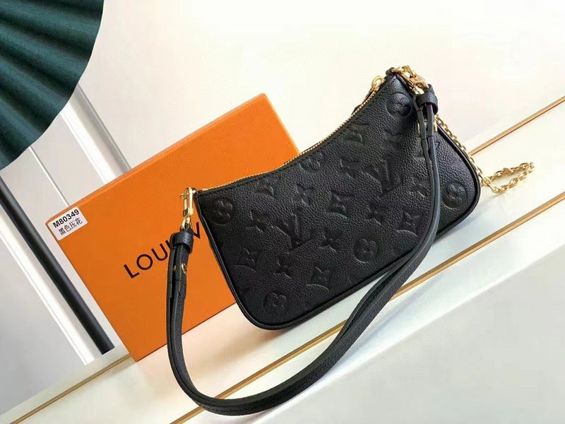 Styled lifestyle shot of everyday-luxe refined women's handbag – women's luxury accessory