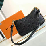 Styled lifestyle shot of everyday-luxe refined women's handbag – women's luxury accessory