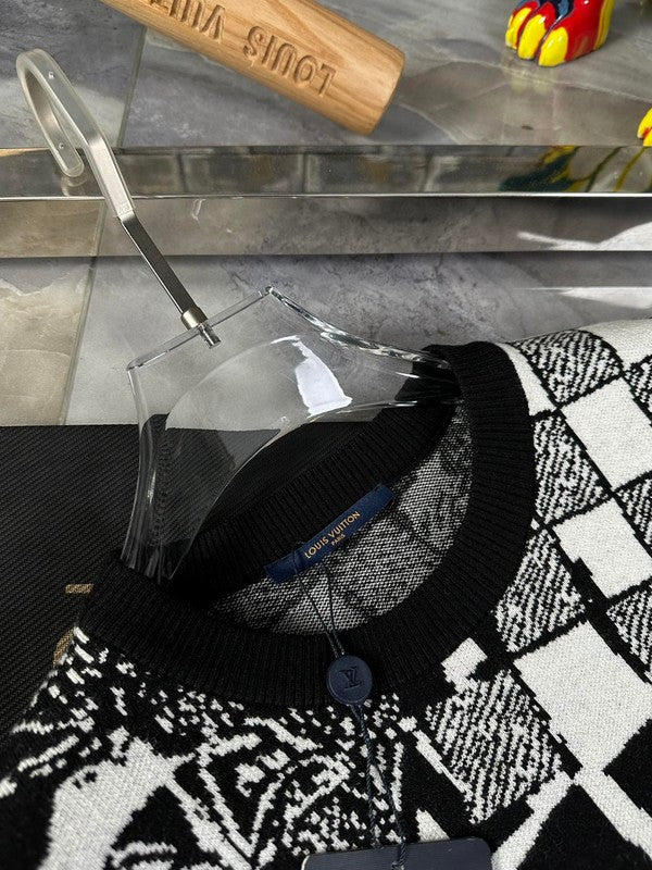 Close-up detail shot of Louis Vuitton luxury clothing with runway-inspired design