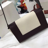 Styled lifestyle shot of structured everyday-luxe women's handbag – women's everyday handbag