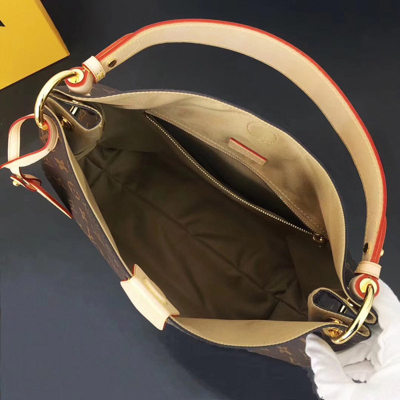 Front view of polished elevated women's handbag – women's statement bag