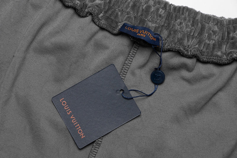 Close-up detail shot of Louis Vuitton cotton t-shirt with label-forward styling