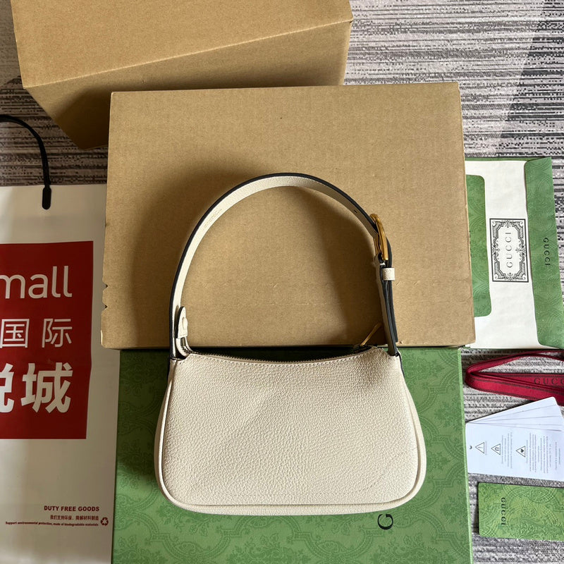 Front view of modern elevated women's handbag – women's luxury accessory