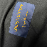 Close-up detail shot of Louis Vuitton luxury clothing with logo-detail design