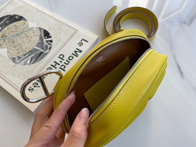 Side view of poised structured handbag