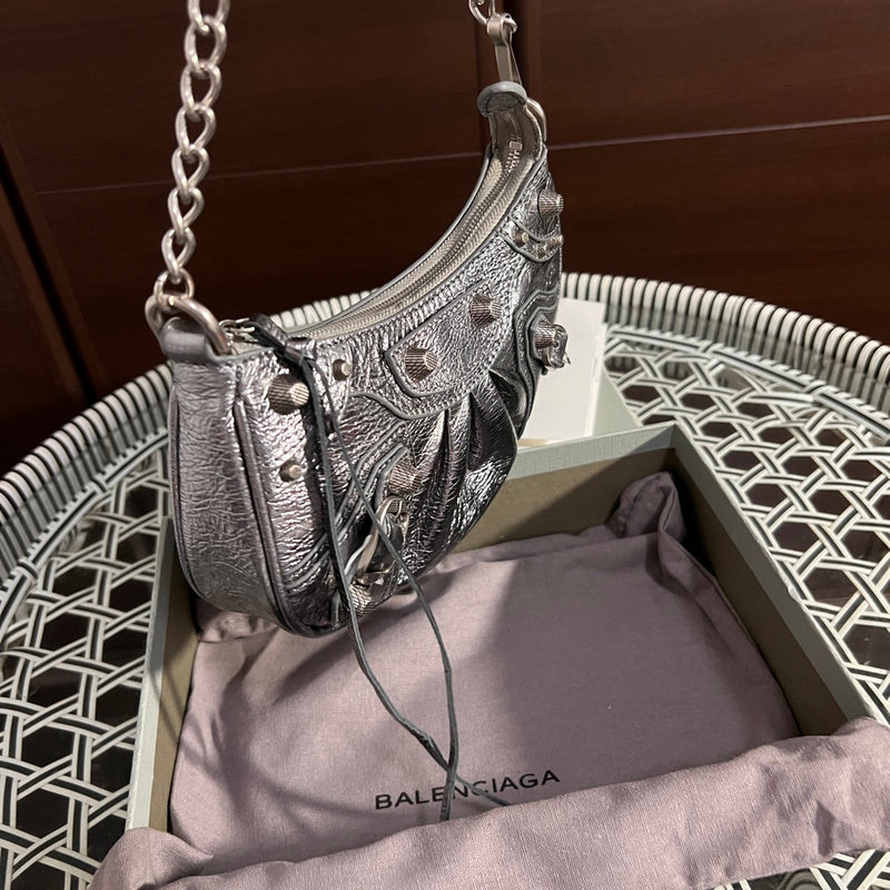 Back view of refined sleek women's handbag – women's statement bag