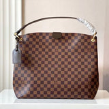 Front view of sleek everyday-luxe women's handbag – women's designer-style accessory