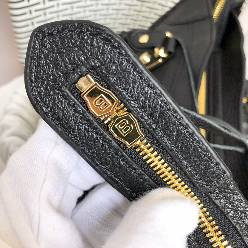 Styled lifestyle shot of structured premium women's handbag – women's luxury accessory