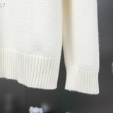 Close-up detail shot of Louis Vuitton luxury clothing with signature branding