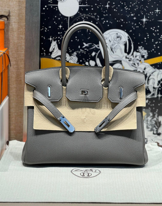 Side view of graceful structured handbag