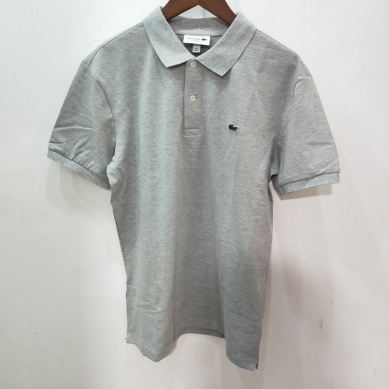 Back view of Lacoste luxury clothing with monogram-inspired silhouette