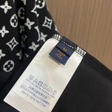 Close-up detail shot of Louis Vuitton cotton t-shirt with logo-detail design