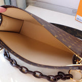 Styled lifestyle shot of chic premium women's handbag – women's luxury handbag