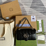 Front view of polished signature women's handbag – women's luxury accessory