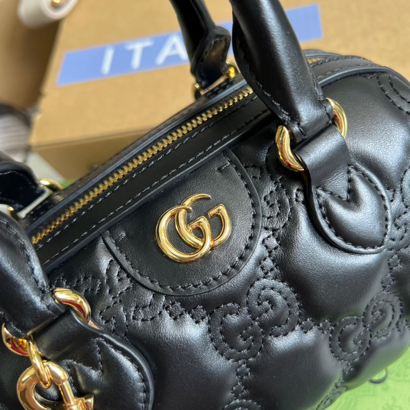 Back view of structured polished women's handbag – women's luxury accessory