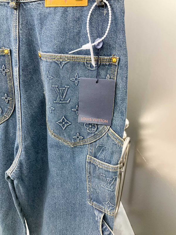 Flat lay presentation of Louis Vuitton luxury clothing with tailored silhouette
