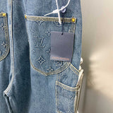 Flat lay presentation of Louis Vuitton luxury clothing with tailored silhouette
