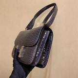 Side view of refined structured handbag