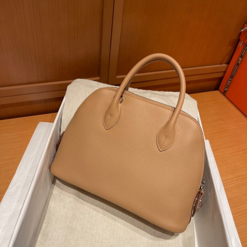 Side view of statement structured handbag