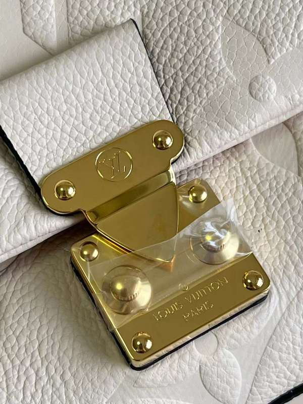 Styled lifestyle shot of everyday-luxe sleek women's handbag – women's luxury handbag