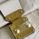 Styled lifestyle shot of everyday-luxe sleek women's handbag – women's luxury handbag