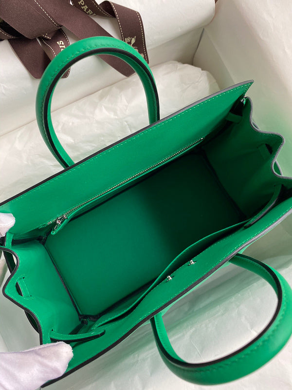 Side view of sculpted structured handbag
