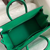 Side view of sculpted structured handbag
