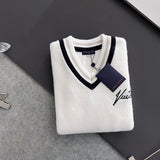 Flat lay presentation of Louis Vuitton luxury clothing with streetwear-inspired cut