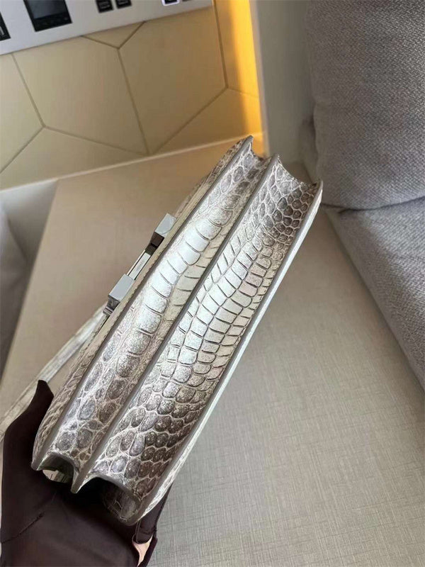 Side view of elegant structured handbag