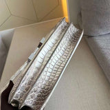 Side view of elegant structured handbag
