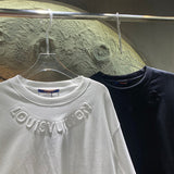 Full styled look of Louis Vuitton cotton t-shirt with runway-inspired design
