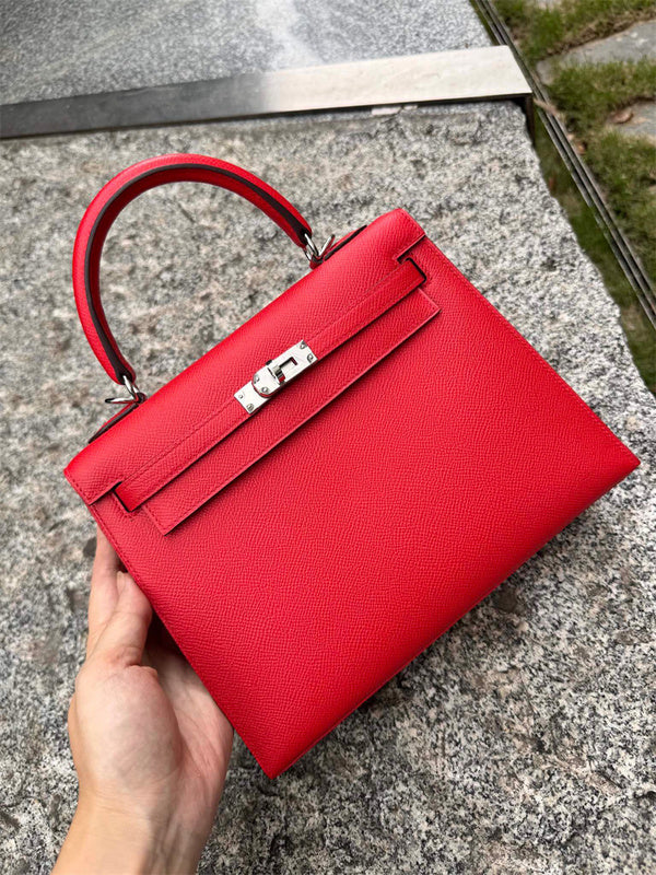 Side view of streamlined structured handbag