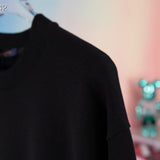 Side profile of Louis Vuitton luxury clothing with tailored silhouette