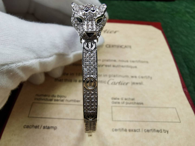 Close-up detail view of Cartier unisex jewelry piece