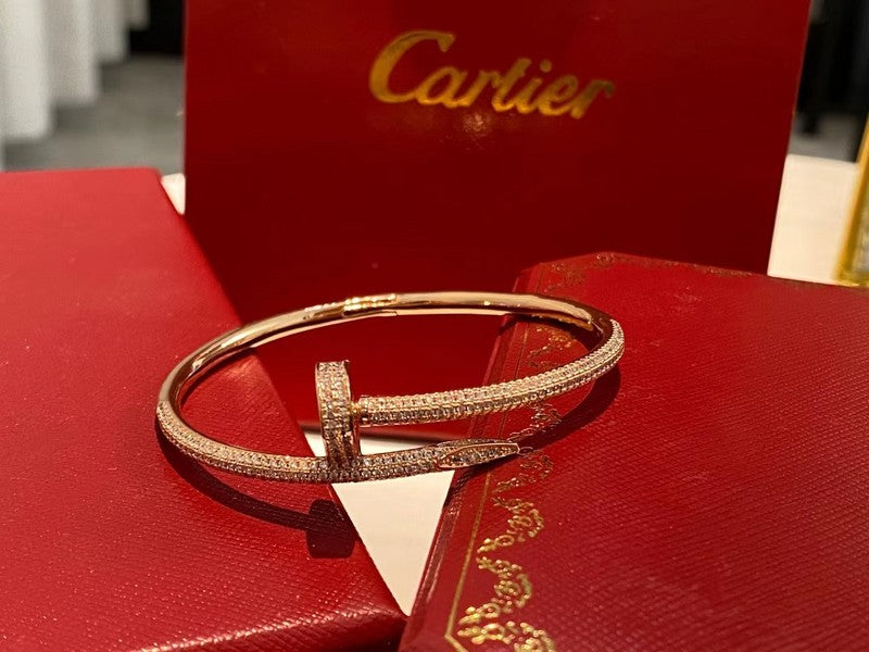 Angled view of Cartier unisex jewelry piece
