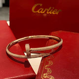 Angled view of Cartier unisex jewelry piece