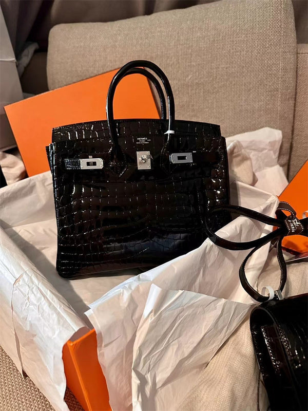  Curated handbag carried on shoulder