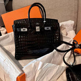  Curated handbag carried on shoulder