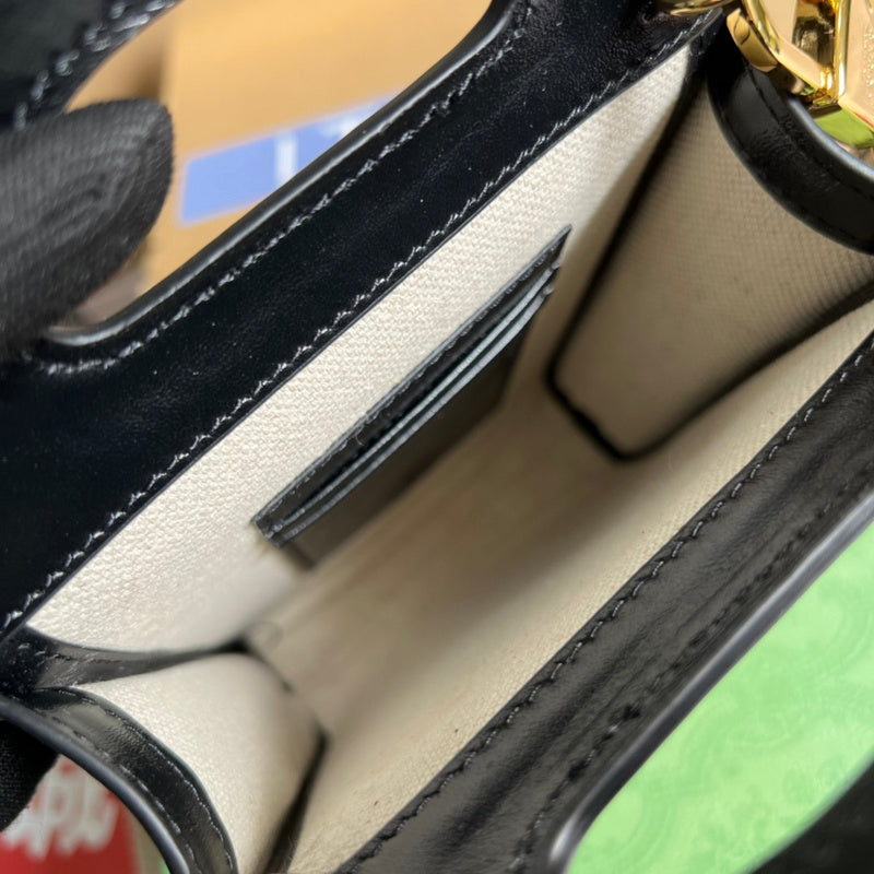 Side view of refined structured handbag