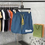 Back view of Rhude luxury clothing with label-forward styling