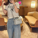  Sophisticated satchel carried on shoulder