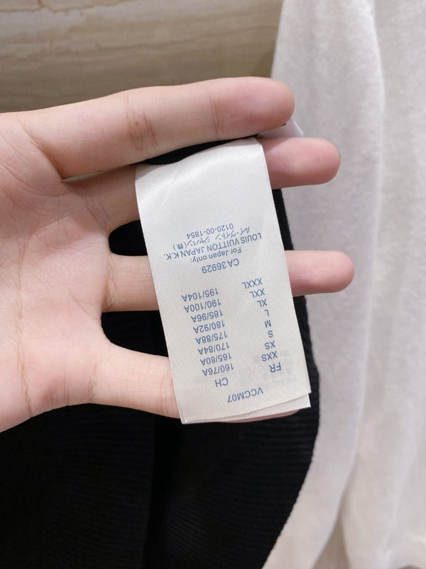 Close-up detail shot of Louis Vuitton luxury clothing with streetwear-inspired cut