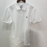 Close-up detail shot of Lacoste luxury clothing with monogram-inspired silhouette