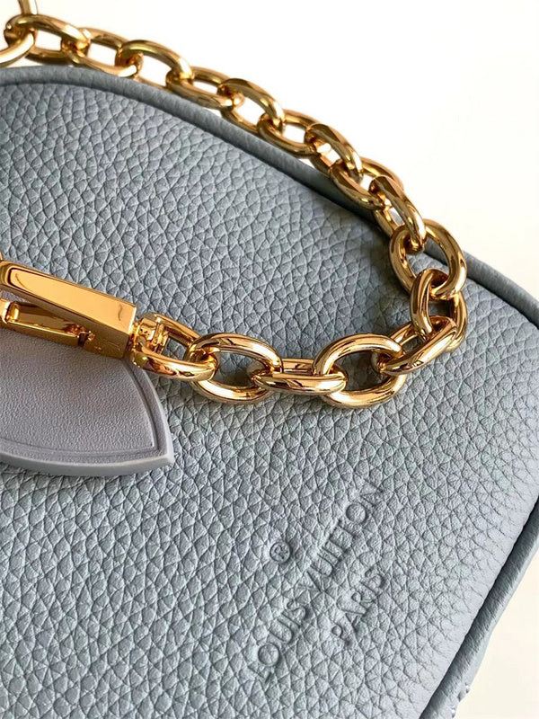  structured crossbody bag styled with outfit