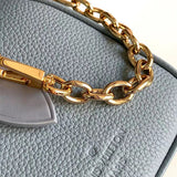  structured crossbody bag styled with outfit