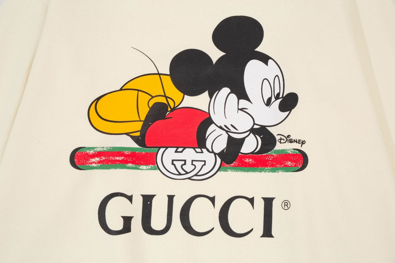 Flat lay presentation of Gucci luxury clothing with streetwear-inspired cut